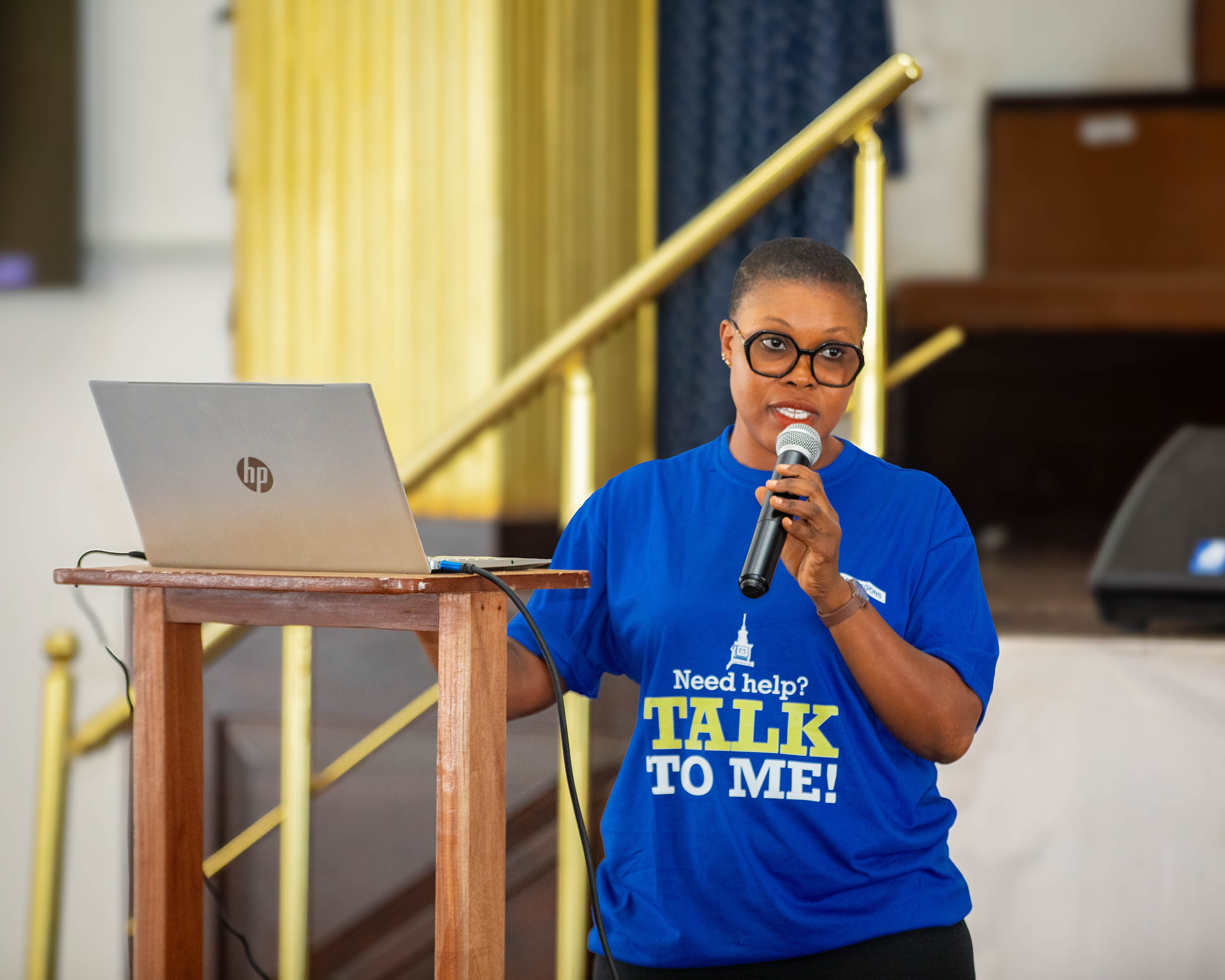 Admissions Representative addressing prospective students