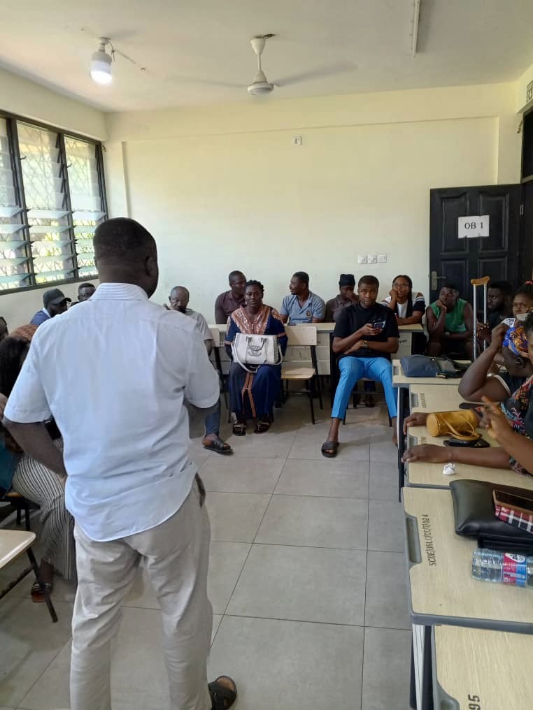 A person standing in front of a group of people in a classroom

AI-generated content may be incorrect.