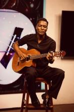 Asiama portrait with guitar