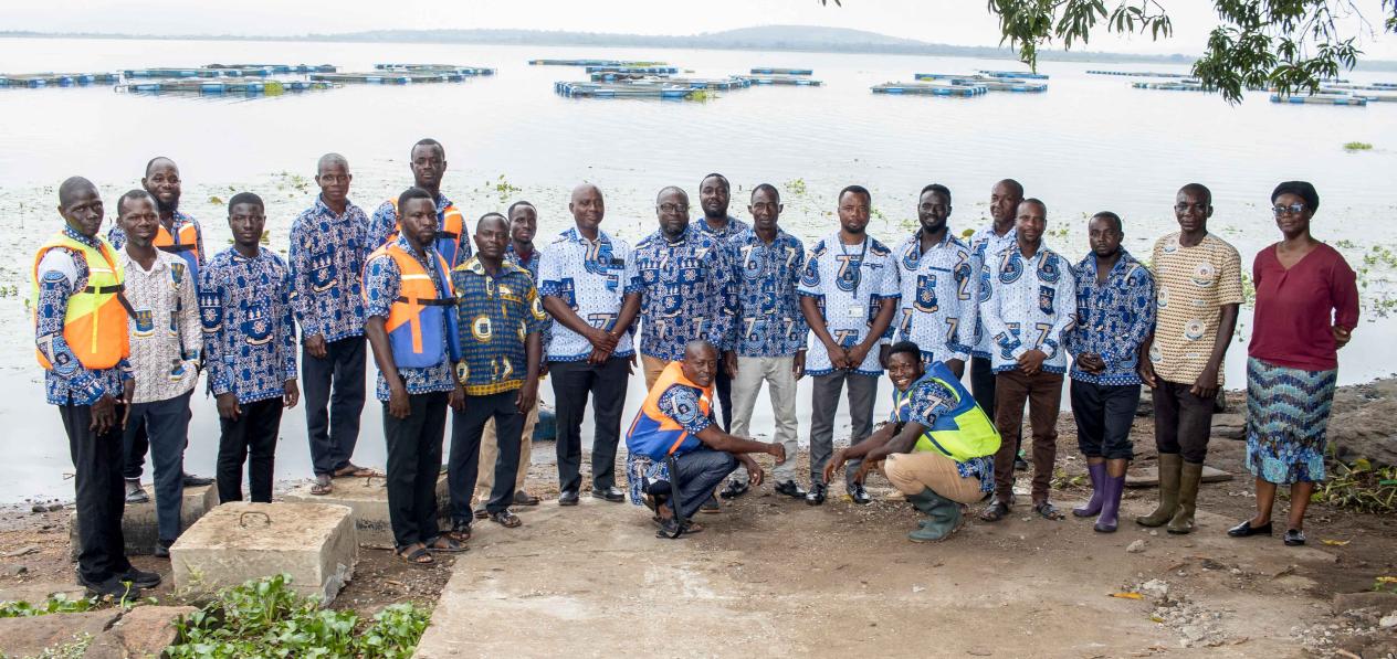 A group photo of the Staff of SIREC at the cage fish project site.